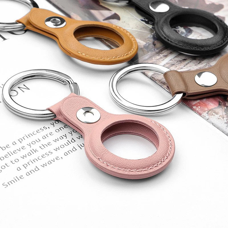 Funda Protectora AirTag de Cuero PU con Llavero: Seguridad y Estilo para Tu Rastreador