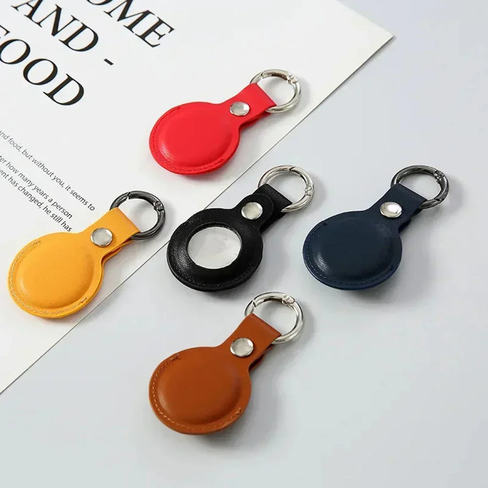 Funda Protectora AirTag de Cuero PU con Llavero: Seguridad y Estilo para Tu Rastreador