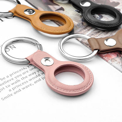Funda Protectora AirTag de Cuero PU con Llavero: Seguridad y Estilo para Tu Rastreador